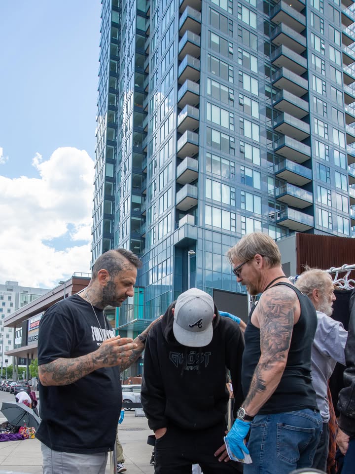 Praying with a neighbour downtown